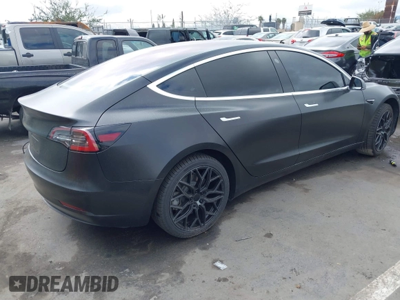 2018 Tesla Model 3 Long Range Battery with VIN 5YJ3E1EA7JF012249, listed as a IAAI auction lot 41782972 with 103,412 mi miles. Bid and sale history available at carsss.com. Image 4.