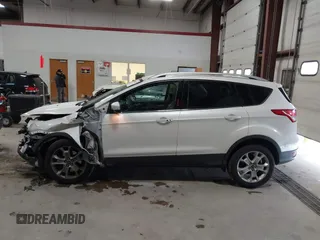 2014 Ford Escape Titanium with VIN 1FMCU9J91EUD43432, listed as a IAAI auction lot 40989177 with 110,383 mi miles and . Bid and sale history available at DreamBid. Image 14.
