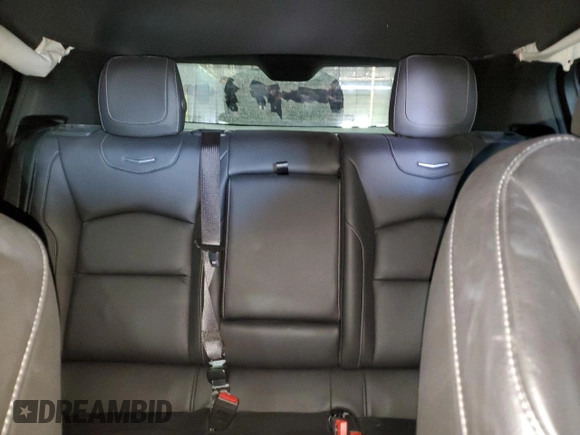 2021 Cadillac XT4 FWD Premium Luxury z VIN 1GYFZCR44MF024208, wystawiony jako Copart lot #46047425 z przebiegiem 40 044 mil mil oraz Nie do naprawy • Non repairable. Historia ofert i sprzedaży dostępna na DreamBid. Obrazek 10.