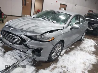2020 Ford Fusion SE with VIN 3FA6P0HD3LR124660, listed as a IAAI auction lot 41598509 with 108,008 mi miles and . Bid and sale history available at DreamBid. Image 2.
