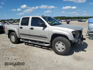 2004 GMC Canyon 1SB SLE Z85 with VIN 1GTDT136948130333, listed as a Copart auction lot 73149664 with 161,997 mi miles and Salvage Title. Bid and sale history available at carsss.com. Image 4.