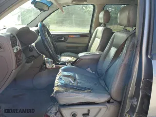 2005 GMC Envoy SLE with VIN 1GKDS13S752277744, listed as a Copart auction lot 51236965 with 248,950 mi miles and Salvage Title. Bid and sale history available at carsss.com. Image 7.
