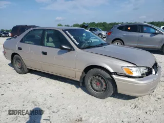 2001 Toyota Camry CE z VIN 4T1BG22KX1U774132, wystawiony jako Copart lot #57632885 z przebiegiem 179 771 mil mil oraz Szkoda całkowita • Salvage title. Historia ofert i sprzedaży dostępna na DreamBid. Obrazek 4.