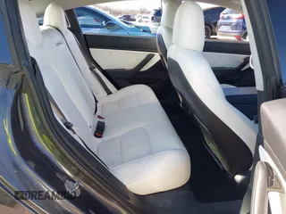2018 Tesla Model 3 Long Range Battery with VIN 5YJ3E1EB6JF122167, listed as a IAAI auction lot 41761710 with 76,199 mi miles and . Bid and sale history available at DreamBid. Image 8.