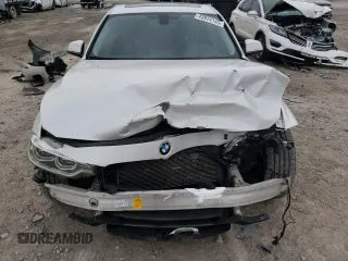 2018 BMW 3 Series 320i xDrive with VIN WBA8E5G53JNV02425, listed as a Copart auction lot 43974145 with 169,091 mi miles and Salvage Title. Bid and sale history available at carsss.com. Image 5.
