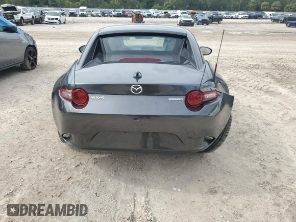 2023 Mazda MX-5 Miata Grand Touring with VIN JM1NDAM7XP0558827, listed as a Copart auction lot 79390864 with 14,901 mi miles and Salvage title. Bid and sale history available at DreamBid. Image 6.