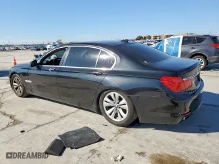 2011 BMW 7 Series 740Li with VIN WBAKB4C53BC574818, listed as a Copart auction lot 46913705 with 105,665 mi miles and Clean Title. Bid and sale history available at carsss.com. Image 2.