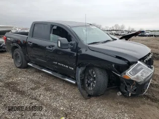 2018 Nissan Titan Pro-4X z VIN 1N6AA1E58JN523036, wystawiony jako Copart lot #45383075 z przebiegiem 153 047 mil mil oraz Czysty tytuł • Clean title. Historia ofert i sprzedaży dostępna na DreamBid. Obrazek 4.