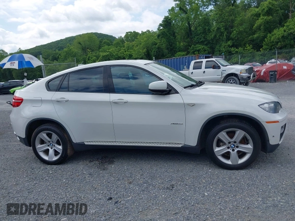 2013 BMW X6 xDrive35i z VIN 5UXFG2C59DL788319, wystawiony jako IAAI lot #42522879 z przebiegiem 158 589 mil mil oraz . Historia ofert i sprzedaży dostępna na DreamBid. Obrazek 13.