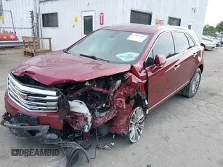 2017 Cadillac XT5 Luxury FWD z VIN 1GYKNBRS1HZ200882, wystawiony jako IAAI lot #42181291 z przebiegiem 95 687 mil mil oraz . Historia ofert i sprzedaży dostępna na DreamBid. Obrazek 17.