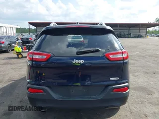 2015 Jeep Cherokee Latitude with VIN 1C4PJLCB5FW694359, listed as a IAAI auction lot 41934213 with 117,723 mi miles and . Bid and sale history available at DreamBid. Image 16.