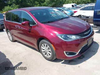2019 Chrysler Pacifica Touring Plus z VIN 2C4RC1FGXKR706264, wystawiony jako IAAI lot #42416570 z przebiegiem 86 897 mil mil oraz . Historia ofert i sprzedaży dostępna na DreamBid. Obrazek 1.