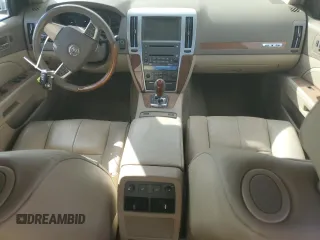 2010 Cadillac STS AWD z VIN 1G6DU6EV9A0138248, wystawiony jako Copart lot #85649154 z przebiegiem 137 227 mil mil oraz Nie do naprawy • Non repairable. Historia ofert i sprzedaży dostępna na DreamBid. Obrazek 8.