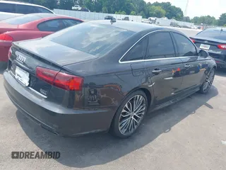 2016 Audi A6 Premium Plus with VIN WAUGFAFCXGN014941, listed as a IAAI auction lot 42566044 with 162,659 mi miles and . Bid and sale history available at DreamBid. Image 4.