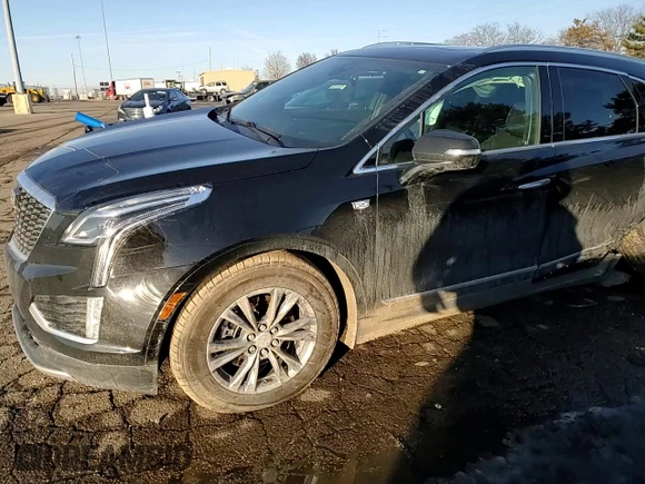 2021 Cadillac XT5 AWD Premium Luxury with VIN 1GYKNDRS6MZ111640, listed as a Copart auction lot 46567035 with 57,484 mi miles and Salvage Title. Bid and sale history available at DreamBid. Image 11.