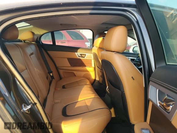 2015 Jaguar XF V6 Portfolio with VIN SAJWA0F76F8U59802, listed as a Copart auction lot 77198104 with 98,859 mi miles and Clean Title. Bid and sale history available at carsss.com. Image 10.