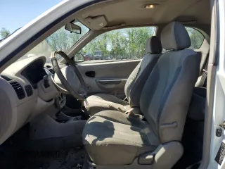 2003 Hyundai Accent с VIN KMHCF35C53U240220, выставлен на аукционе Copart как лот 52581415 с пробегом 102 322 миль миль и Списание • Salvage title. История ставок и продаж доступна на DreamBid. Изображение 7.