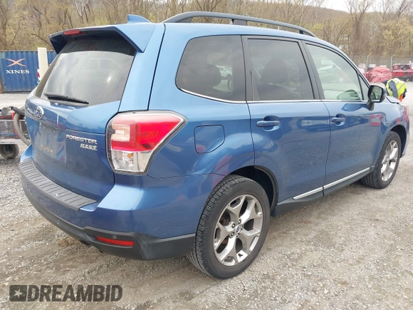 2017 Subaru Forester Touring with VIN JF2SJAWC1HH443799, listed as a IAAI auction lot 41943045 with 122,213 mi miles and . Bid and sale history available at DreamBid. Image 4.