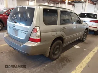2007 Subaru Forester X w/Premium Pkg with VIN JF1SG65657H719525, listed as a IAAI auction lot 41696437 with 217,895 mi miles. Bid and sale history available at carsss.com. Image 4.