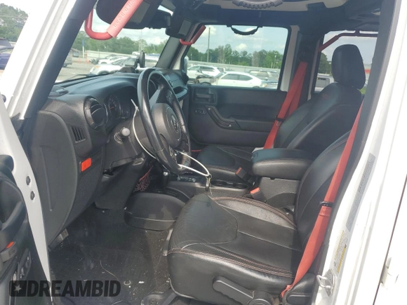 2017 Jeep Wrangler Unlimited Rubicon Recon with VIN 1C4BJWFG7HL696895, listed as a Copart auction lot 57409625 with 50,802 mi miles and Salvage title. Bid and sale history available at DreamBid. Image 7.
