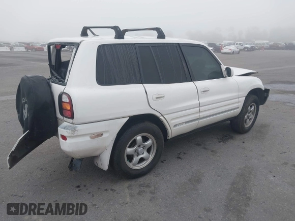 1999 Toyota RAV4 with VIN JT3GP10V0X7050334, listed as a IAAI auction lot 41607894 with 348,069 mi miles and . Bid and sale history available at DreamBid. Image 4.