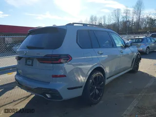 2024 BMW X7 xDrive40i with VIN 5UX23EM02R9V69737, listed as a IAAI auction lot 41456396 with 11,803 mi miles. Bid and sale history available at carsss.com. Image 4.