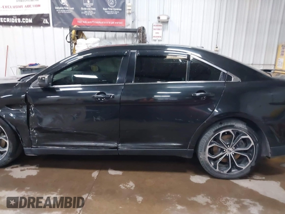 2015 Ford Taurus SHO with VIN 1FAHP2KT6FG137418, listed as a IAAI auction lot 42256452 with 140,335 mi miles and . Bid and sale history available at DreamBid. Image 14.