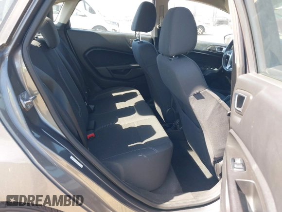 2014 Ford Fiesta SE z VIN 3FADP4BJ6EM117845, wystawiony jako IAAI lot #42431152 z przebiegiem 97 742 mil mil oraz . Historia ofert i sprzedaży dostępna na DreamBid. Obrazek 8.