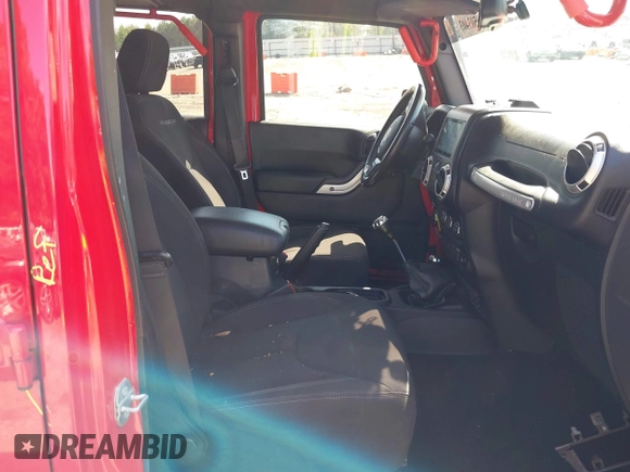 2016 Jeep Wrangler Unlimited Rubicon with VIN 1C4HJWFG7GL128994, listed as a IAAI auction lot 40503403 with 85,950 mi miles. Bid and sale history available at carsss.com. Image 5.