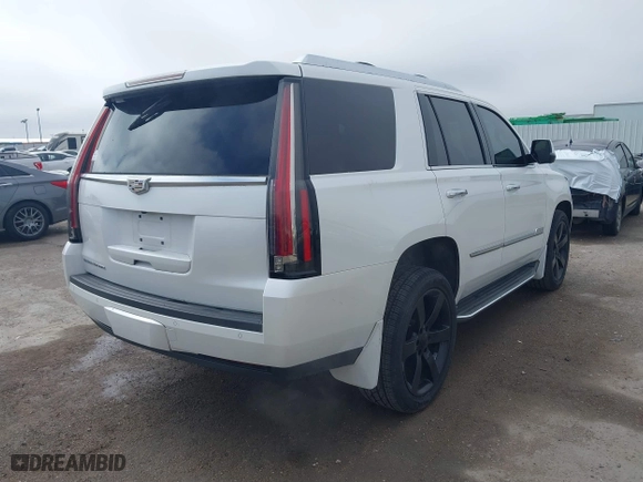 2016 Cadillac Escalade Luxury Collection with VIN 1GYS4BKJ2GR156944, listed as a IAAI auction lot 41644192 with 135,862 mi miles. Bid and sale history available at carsss.com. Image 4.