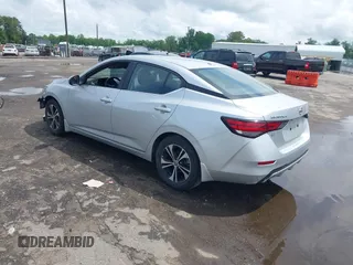 2021 Nissan Sentra SV z VIN 3N1AB8CV5MY299245, wystawiony jako IAAI lot #42180004 z przebiegiem 25 856 mil mil oraz . Historia ofert i sprzedaży dostępna na DreamBid. Obrazek 3.