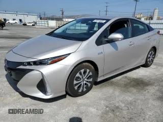 2021 Toyota Prius LE z VIN JTDKAMFP0M3165598, wystawiony jako Copart lot #59914605 z przebiegiem 40 189 mil mil oraz Szkoda całkowita • Salvage title. Historia ofert i sprzedaży dostępna na DreamBid. Obrazek 1.