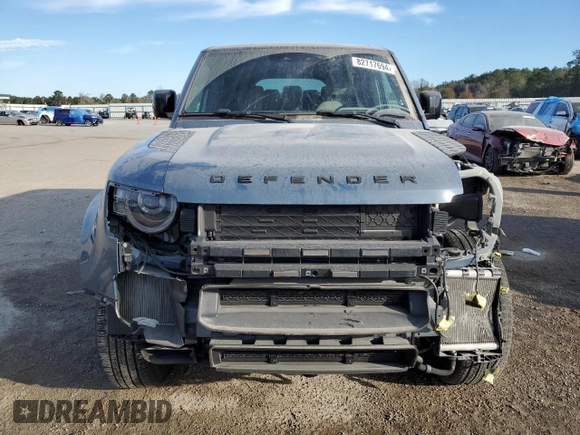 2023 Land Rover Defender SE with VIN SALEPEEU8P2115950, listed as a Copart auction lot 82717694 with 18,246 mi miles and Salvage title. Bid and sale history available at DreamBid. Image 5.