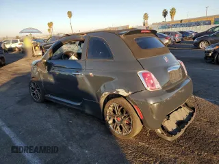 2017 FIAT 500 Abarth z VIN 3C3CFFJH5HT506199, wystawiony jako Copart lot #79272934 z przebiegiem 99 999 mil mil oraz Tytuł czysty. Historia ofert i sprzedaży dostępna na DreamBid. Obrazek 2.