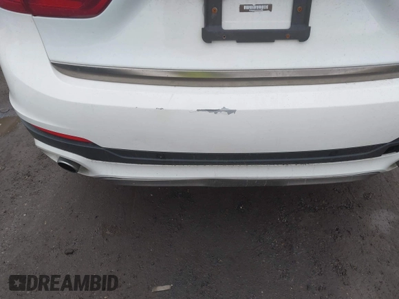 2015 BMW X6 xDrive35i with VIN 5UXKU2C57F0N77194, listed as a IAAI auction lot 41818860 with 105,579 mi miles and . Bid and sale history available at DreamBid. Image 17.