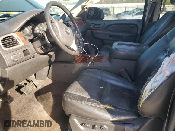 2013 Chevrolet Tahoe LTZ with VIN 1GNSCCE04DR162474, listed as a Copart auction lot 49386335 with 331,358 mi miles and Salvage title. Bid and sale history available at DreamBid. Image 7.