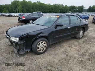 1999 Nissan Maxima GXE z VIN JN1CA21D1XT803886, wystawiony jako Copart lot #55937195 z przebiegiem 288 948 mil mil oraz Szkoda całkowita • Salvage title. Historia ofert i sprzedaży dostępna na DreamBid. Obrazek 1.