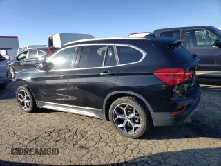 2018 BMW X1 xDrive28i with VIN WBXHT3C38J5K24660, listed as a Copart auction lot 44387043 with 59,786 mi miles. Bid and sale history available at carsss.com. Image 2.