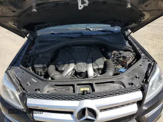 2014 Mercedes-Benz GL 450 z VIN 4JGDF7CE0EA426199, wystawiony jako Copart lot #52172115 z przebiegiem 114 749 mil mil oraz Szkoda całkowita • Salvage title. Historia ofert i sprzedaży dostępna na DreamBid. Obrazek 13.