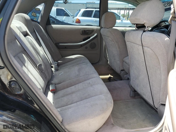 1997 Toyota Avalon XL with VIN 4T1BF12B9VU160305, listed as a Copart auction lot 52998515 with 166,368 mi miles and Clean Title. Bid and sale history available at carsss.com. Image 10.