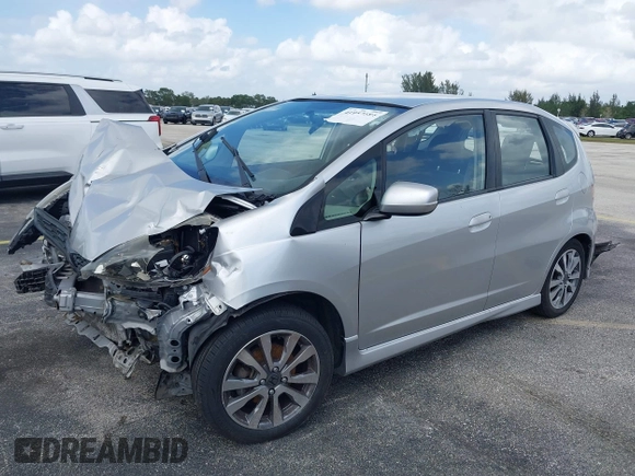 2012 Honda Fit Sport with VIN JHMGE8H5XCC034799, listed as a IAAI auction lot 41957184 with 86,373 mi miles. Bid and sale history available at carsss.com. Image 2.