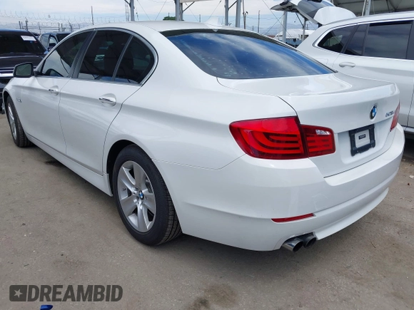 2013 BMW 5 Series 528i with VIN WBAXG5C50DDY34618, listed as a IAAI auction lot 42018050 with 85,272 mi miles and . Bid and sale history available at carsss.com. Image 3.