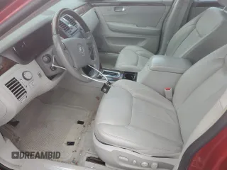 2011 Cadillac DTS Premium Collection z VIN 1G6KH5E66BU122873, wystawiony jako Copart lot #55515185 z przebiegiem 84 092 mil mil oraz Szkoda całkowita • Salvage title. Historia ofert i sprzedaży dostępna na DreamBid. Obrazek 7.