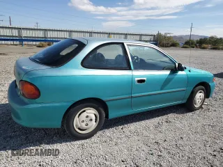 1995 Hyundai Accent z VIN KMHVD14N1SU015961, wystawiony jako Copart lot #72066404 z przebiegiem 118 163 mil mil oraz Szkody całkowita. Historia ofert i sprzedaży dostępna na DreamBid. Obrazek 3.