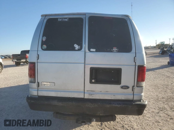 2002 Ford Econoline Passenger XL с VIN 1FBSS31S92HA05274, выставлен на аукционе Copart как лот 85349444 с пробегом 492 474 миль миль и Списание • Salvage title. История ставок и продаж доступна на DreamBid. Изображение 6.