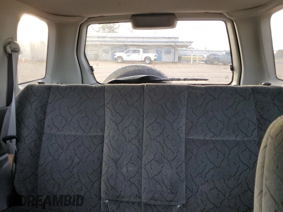 2004 Chevrolet Tracker LT z VIN 2CNBE634X46900683, wystawiony jako Copart lot #88601815 z przebiegiem 146 915 mil mil oraz Szkoda całkowita • Salvage title. Historia ofert i sprzedaży dostępna na DreamBid. Obrazek 10.
