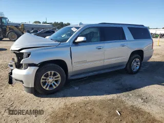 2015 Chevrolet Suburban LT with VIN 1GNSCJKC5FR563554, listed as a Copart auction lot 89369475 with 199,609 mi miles and Salvage Title. Bid and sale history available at carsss.com. Image 1.
