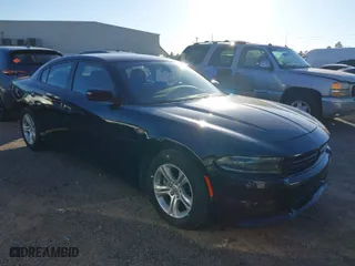 2022 Dodge Charger SXT with VIN 2C3CDXBG7NH239332, listed as a IAAI auction lot 41213933 with 61,840 mi miles. Bid and sale history available at carsss.com. Image 1.