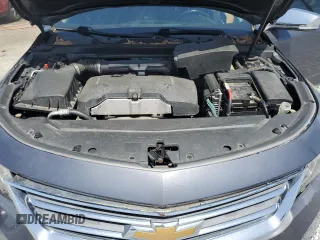 2014 Chevrolet Impala LT with VIN 2G1115SL2E9244163, listed as a Copart auction lot 57328675 with 136,548 mi miles and Salvage title. Bid and sale history available at DreamBid. Image 11.