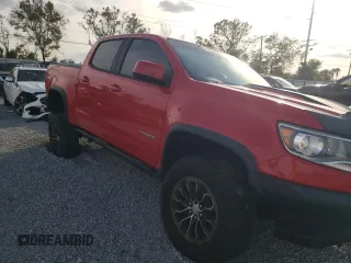 2019 Chevrolet Colorado 4WD ZR2 with VIN 1GCPTEE11K1157456, listed as a Copart auction lot 81283874 with 119,402 mi miles and Salvage title. Bid and sale history available at DreamBid. Image 4.